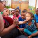 teacher reading books to kids