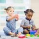 2 toddlers playing